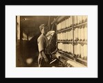 John Dempsey, 11 or 12 years old, Saturday worker in the mule-spinning room at Jackson Mill, Fiskeville, Rhode Island, 1909 by Lewis Wickes Hine