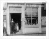 E.J. Crane, watchmaker and jewelry store, c.1899 by American Photographer