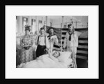 Taking a patient's pulse, Brooklyn Navy Yard Hospital, c.1890-1901 by Detroit Publishing Co.