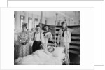 Taking a patient's pulse, Brooklyn Navy Yard Hospital, c.1890-1901 by Detroit Publishing Co.