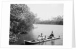 Seminole Indian and family dugout canoe, Miami, Florida, c.1910-20 by Detroit Publishing Co.