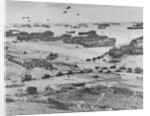 D Day: view of landing craft, barrage balloons, and allied troops landing in Normandy, 1944 by American Photographer