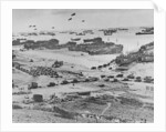 D Day: view of landing craft, barrage balloons, and allied troops landing in Normandy, 1944 by American Photographer
