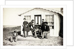 Five Civil War soldiers gathered on dirt porch outside home, African American youth seated near them, 1861-65 by American Photographer