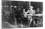 Woman broaching key seat in front sight carrier for rifle, Eddystone Rifle Plant, Eddystone, Pa., during World War I, 1914-18 by American Photographer