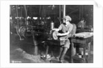 Woman broaching key seat in front sight carrier for rifle, Eddystone Rifle Plant, Eddystone, Pa., during World War I, 1914-18 by American Photographer