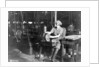 Woman broaching key seat in front sight carrier for rifle, Eddystone Rifle Plant, Eddystone, Pa., during World War I, 1914-18 by American Photographer