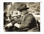 Theodore Roosevelt smiling from an automobile by Anonymous