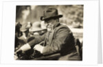 Theodore Roosevelt smiling from an automobile by Anonymous