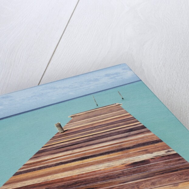 Wooden jetty leading out to sea by Anonymous