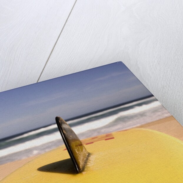 Lifeguard's Surfboard on Beach by Anonymous