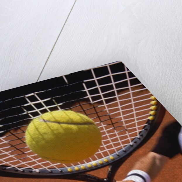 Man playing tennis by Anonymous