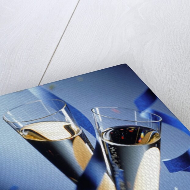 Two champagne glasses and ribbons by Anonymous