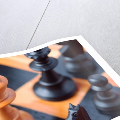 Chess pieces on chessboard by Anonymous