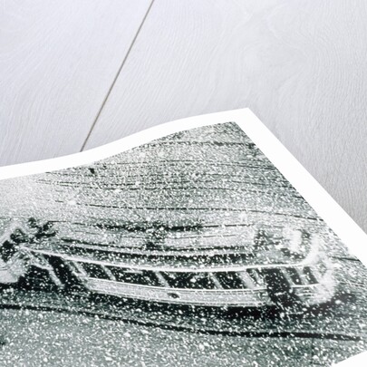Urban traffic during snowfall, historic photo by Anonymous
