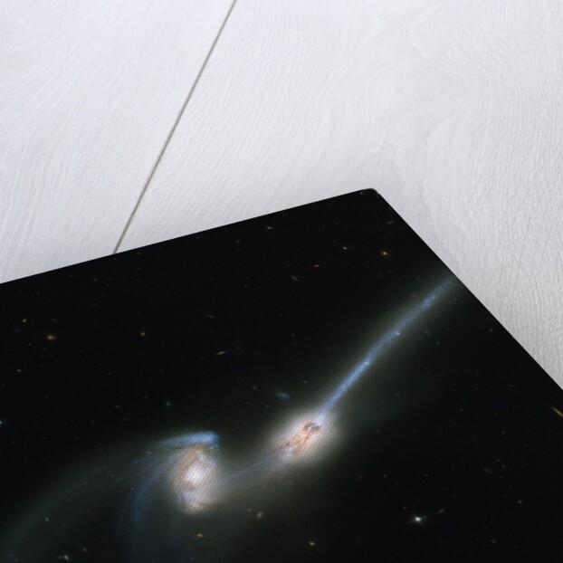 Two Merging Galaxies by Anonymous
