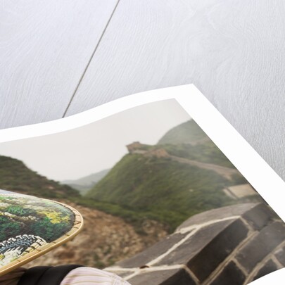 Tourist Wearing Illustrated Conical Hat on the Great Wall by Anonymous