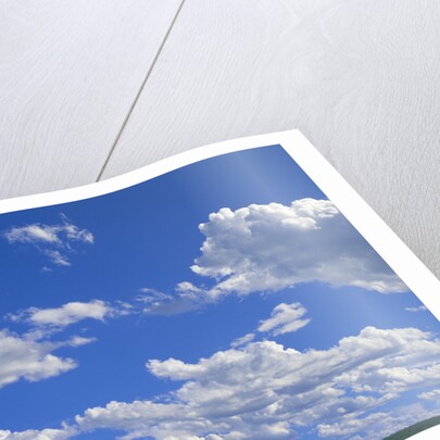 Cumulus Clouds Over Summer Tundra by Anonymous