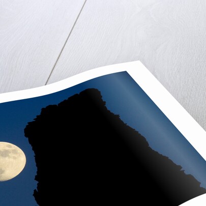 Full Moon Beside Rock by Anonymous