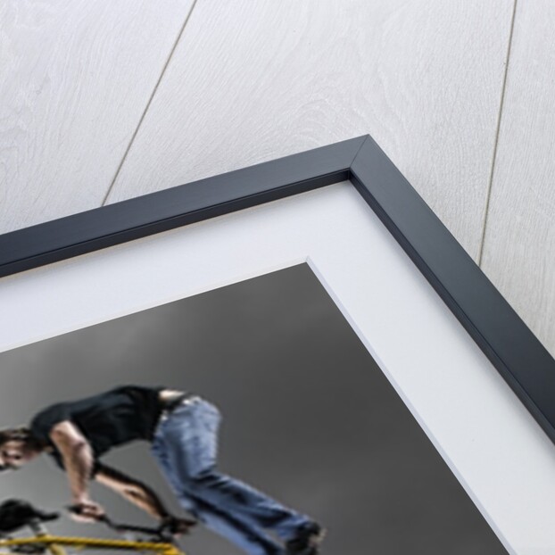 BMX Biker Performing Tricks by Anonymous