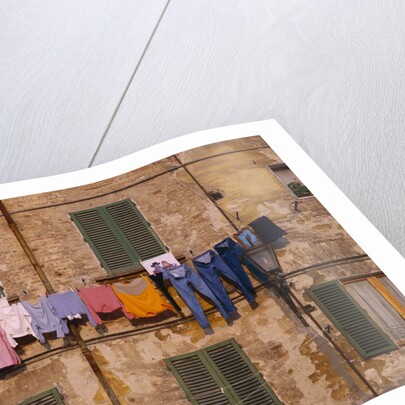 Laundry Hanging Outside Windows by Anonymous