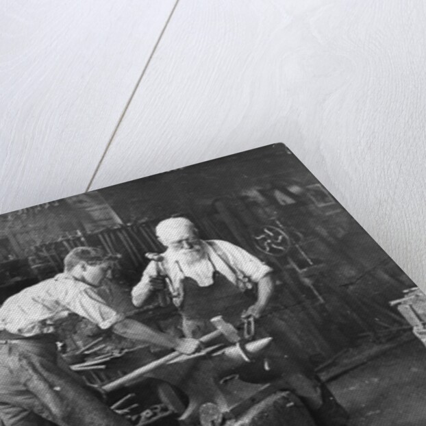 Blacksmiths at Work by Anonymous