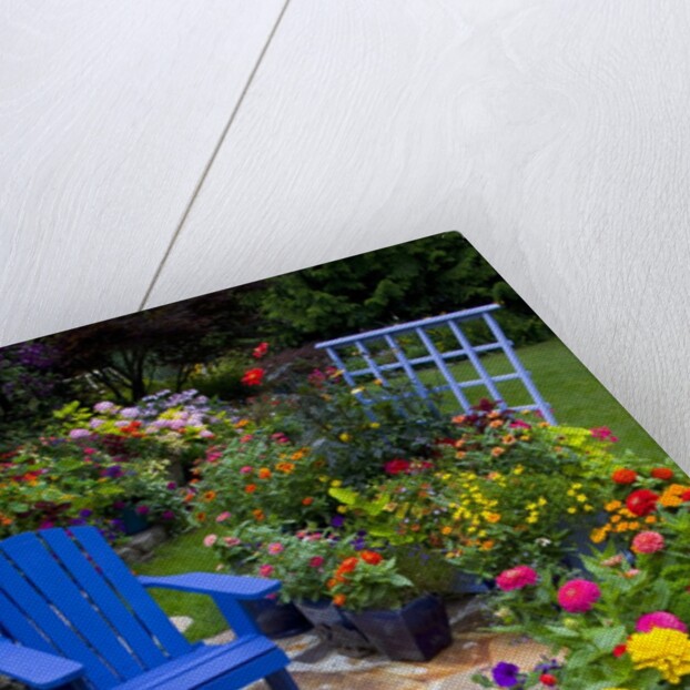 Backyard Flower Garden With Chair by Anonymous