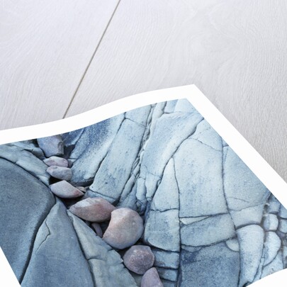 Rocks Against Cracked Boulder by Anonymous