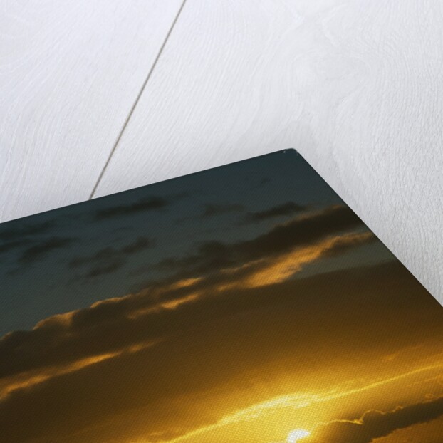 Sun in Cloudy Sky by Anonymous