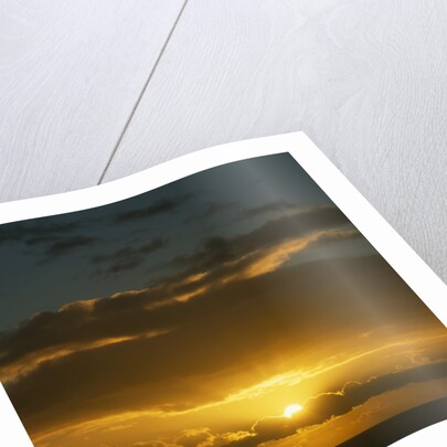 Sun in Cloudy Sky by Anonymous