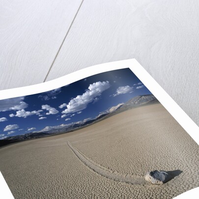 Rock Pushed by Wind in Desert by Anonymous