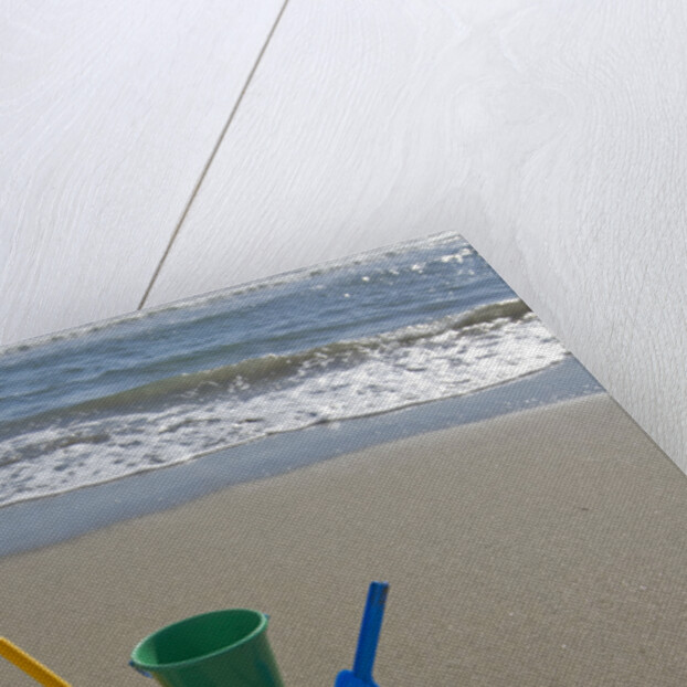 Toy Shovels in Sand by Anonymous