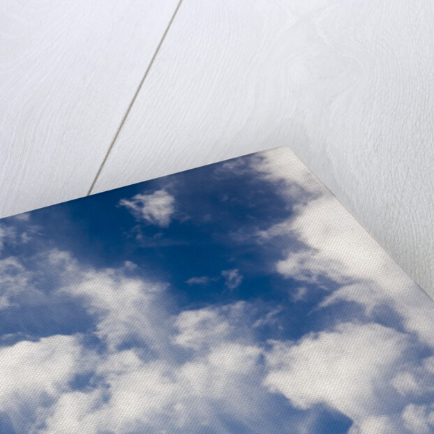 Wind Swept Clouds in Blue Sky by Anonymous
