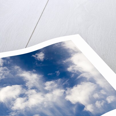Wind Swept Clouds in Blue Sky by Anonymous