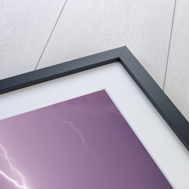 Lightning Striking near Lake by Corbis