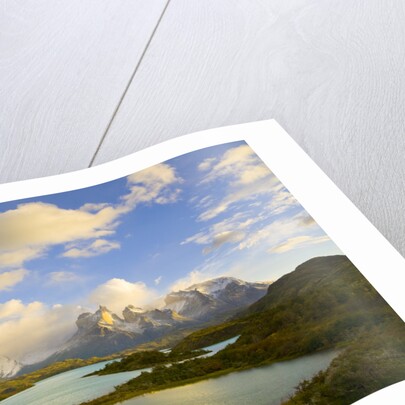 Mountains Shrouded in Clouds near Lake by Anonymous