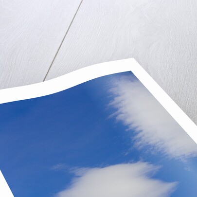 Clouds and Snowy Mountain Peak by Anonymous