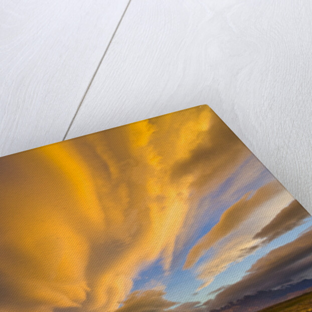 Dramatic Clouds above Plains at Sunset by Anonymous