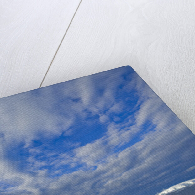 Clouds Above Sea and Snow-covered Coast by Anonymous