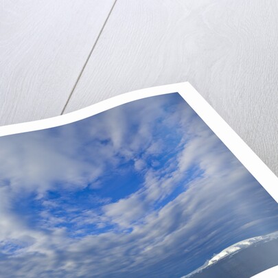 Clouds Above Sea and Snow-covered Coast by Anonymous