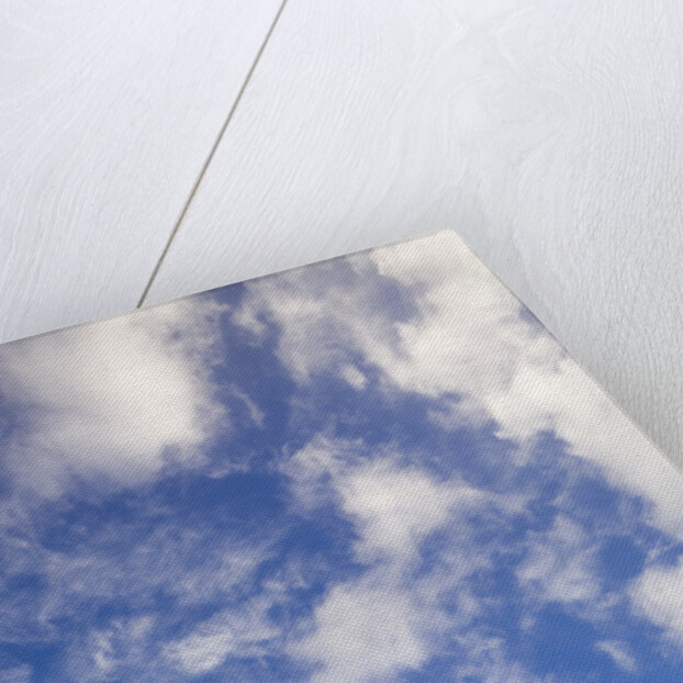 Cumulus Clouds above Hill by Anonymous