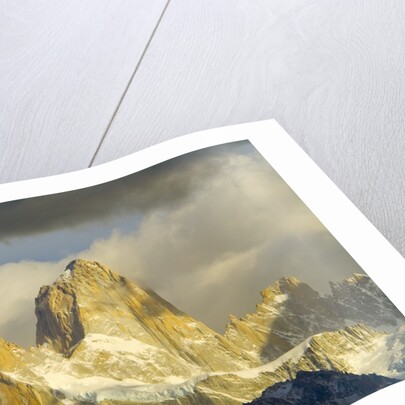 Fitzroy Massif and Cumulus Clouds at Sunrise by Anonymous