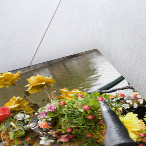 Bicycle with Flowers Beside a Canal by Anonymous