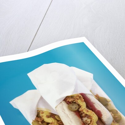 Three hot dogs in buns by Anonymous