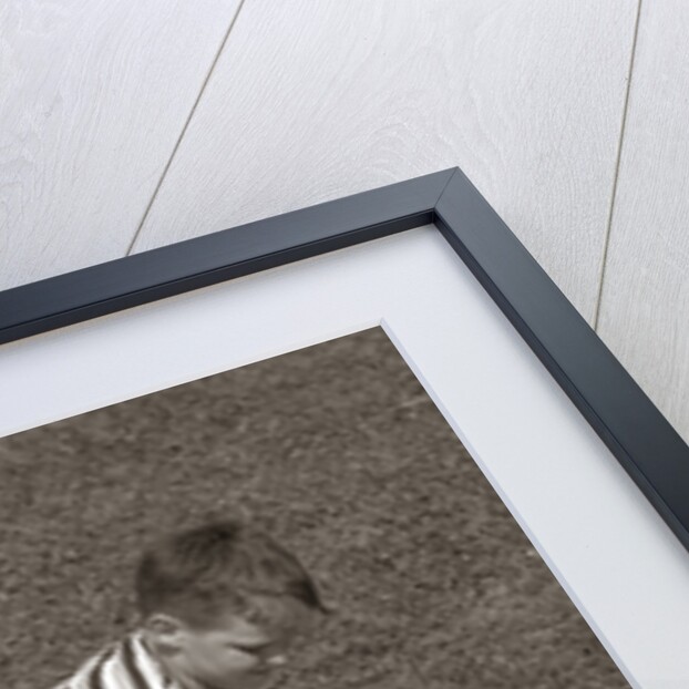 1950s Two Boys Wear Tee Shirts Blue Jeans Playing Rough Fighting Wrestling On The Grass by Anonymous