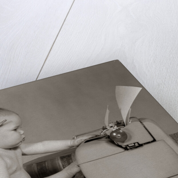 1960s Businesslike Baby With Pencil Behind Ear Typing On Typewriter by Anonymous