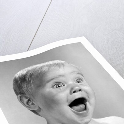 1960s Portrait Baby With Eyes And Mouth Wide Open by Anonymous