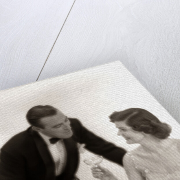 1950s Formal Dress Couple Man In Tuxedo Woman Wearing Gown Holding Champagne Glass by Anonymous