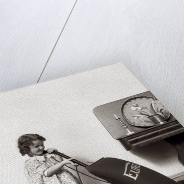 1930s Little Girl Vacuuming With Eureka Electric Vacuum Cleaner by Anonymous