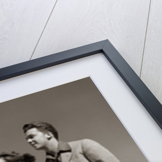 1940s Teenage Couple Standing Together Outdoors Girl Pointing by Anonymous